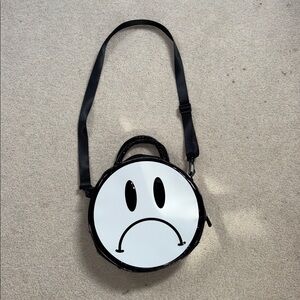 Killstar pocketbook . Polyester., handles and strap. Zippered